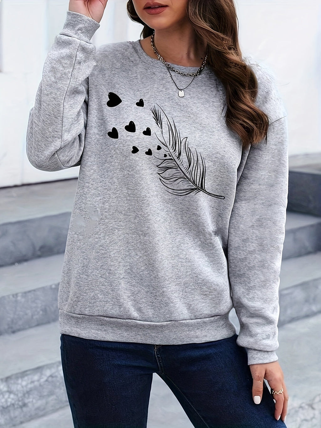 Casual sweatshirt met verenprint