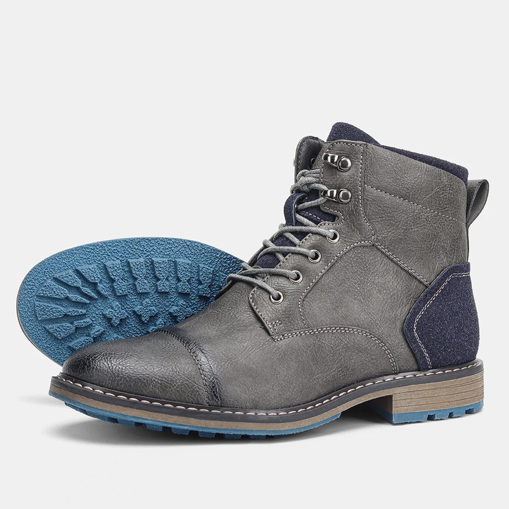 Herenenkelboots van rundleer met neuskap en zijrits