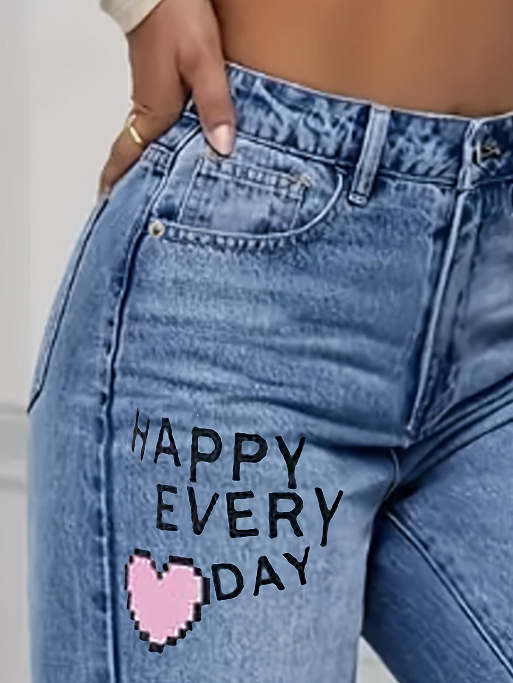 Dames jeans met hartjes- en graffitiprint