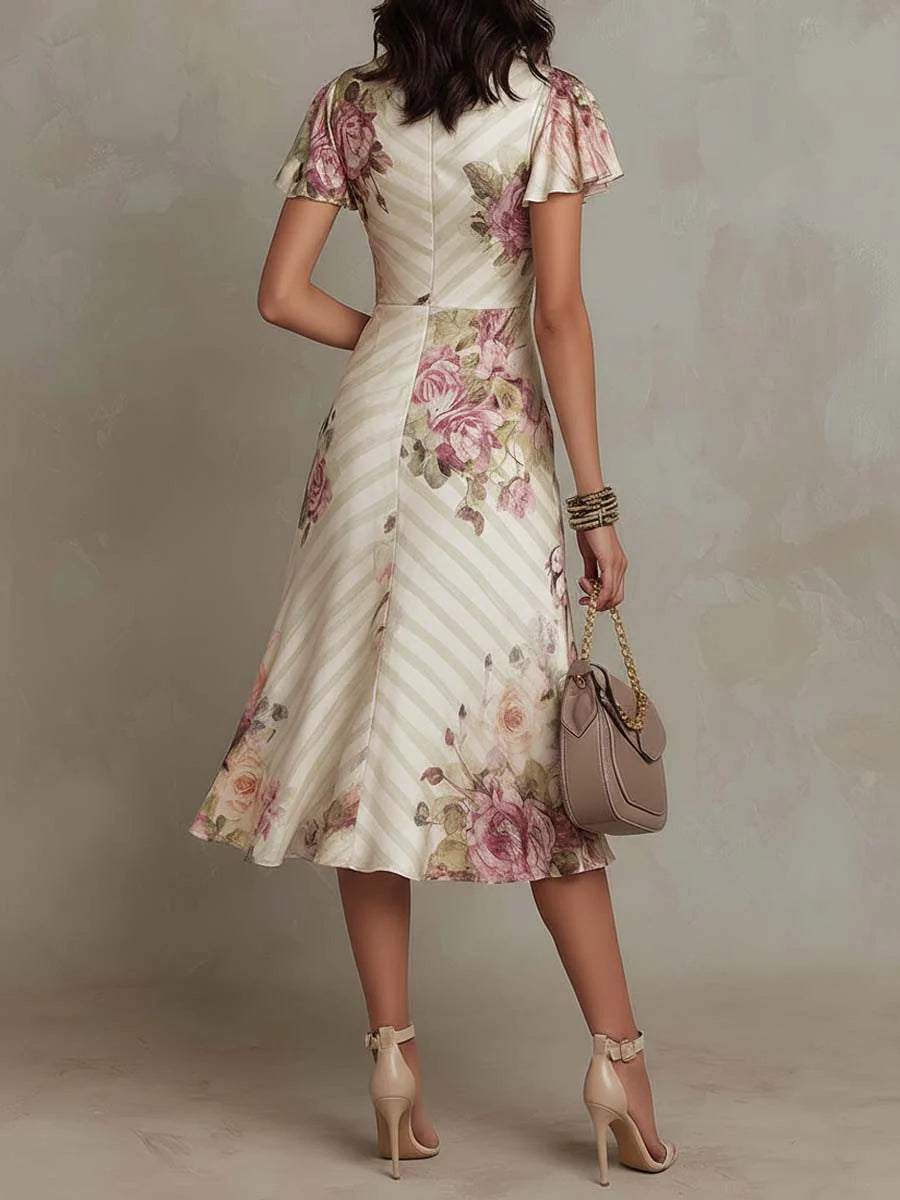 Miriam | Midi-jurk met bloemenprint en ruchesmouwen