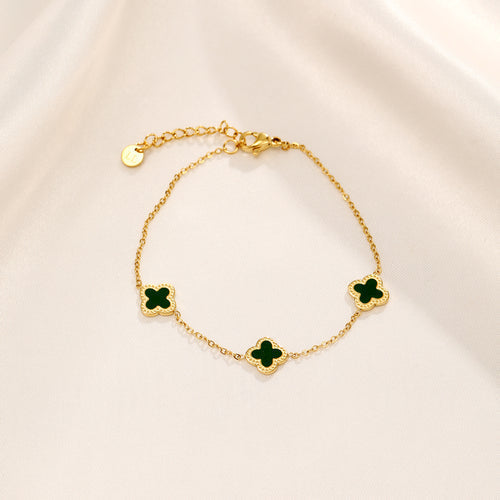 Vergulde armband met groene klaver