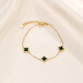Vergulde armband met groene klaver