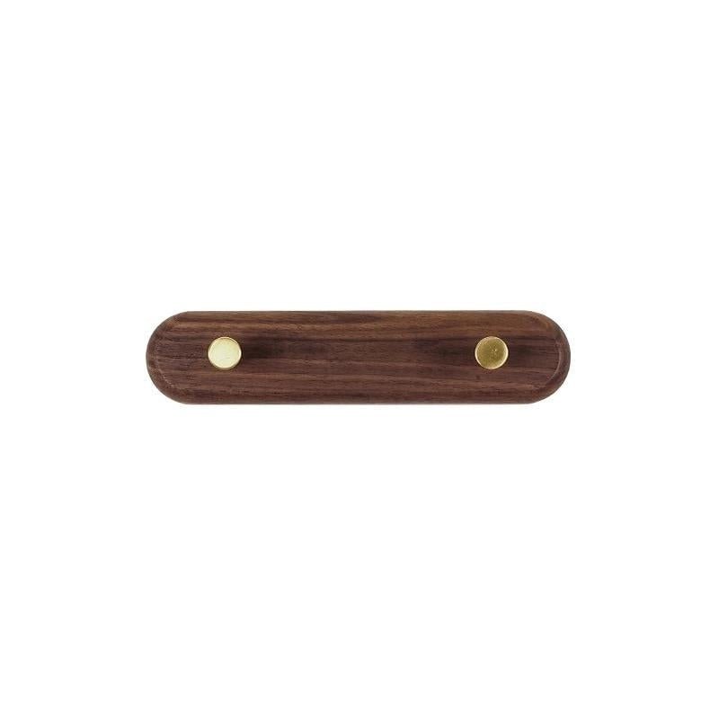 Wandkapstok van hout met messing haken