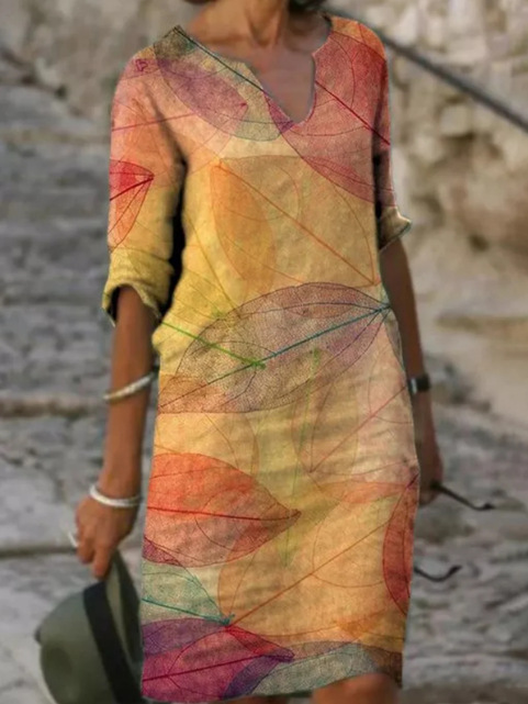 Hilde | Damesmidijurk met V-hals en veelkleurige print