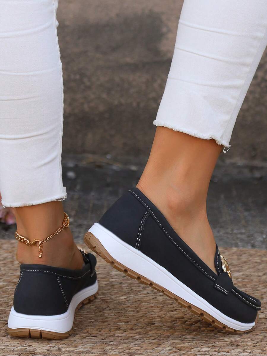 Brede damesloafers met flexibele rubberen antislipzool
