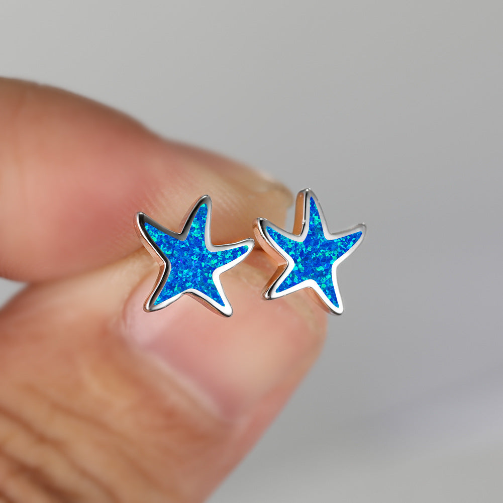 Blauwe opaal zeester oorbellen