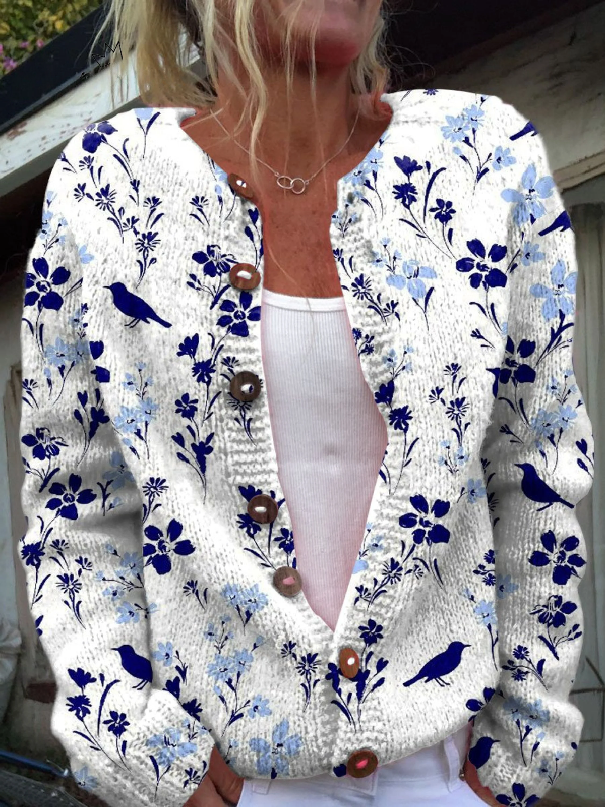 Gebreid vest met vintage vogel- en bloemenprint