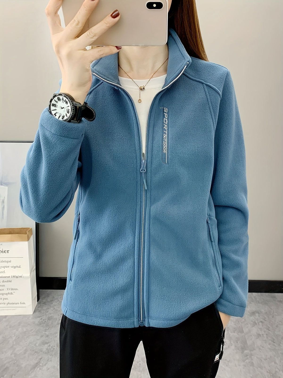 Ademende fleece jas