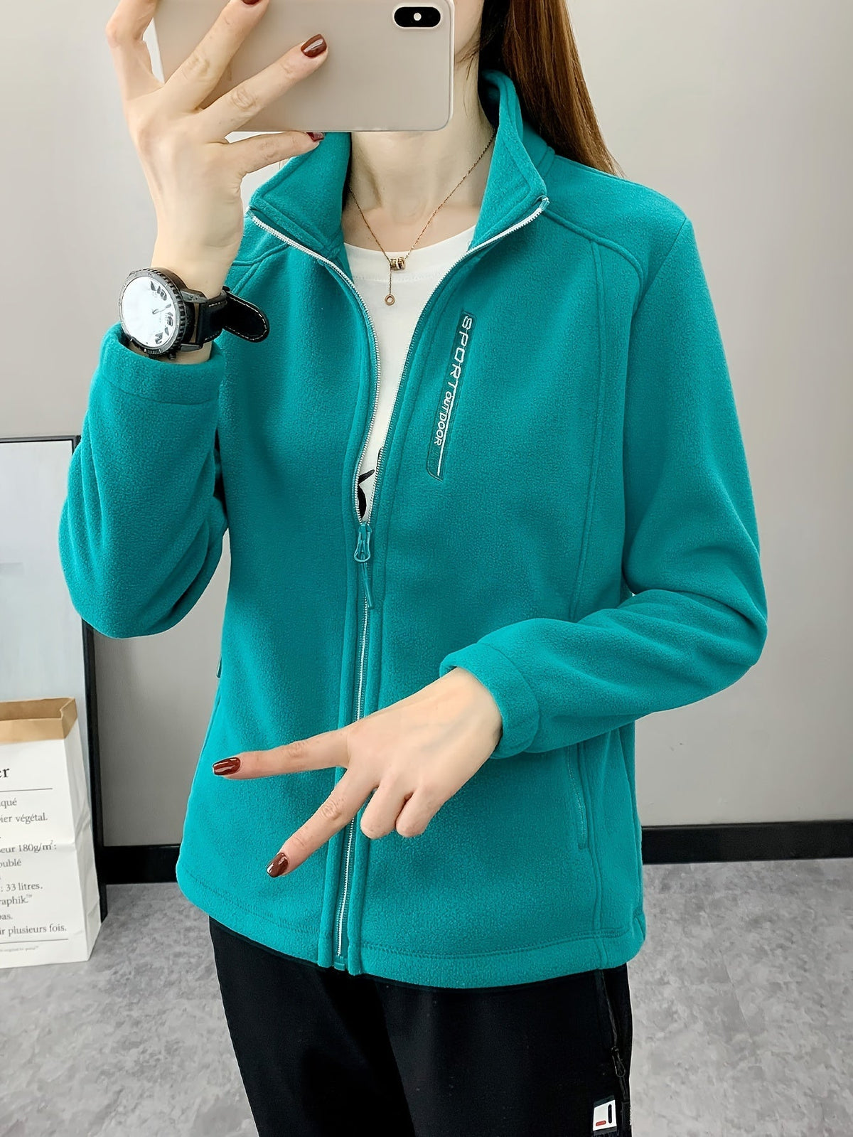 Ademende fleece jas