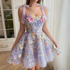 Tulle cocktailjurk met bloemenapplicaties