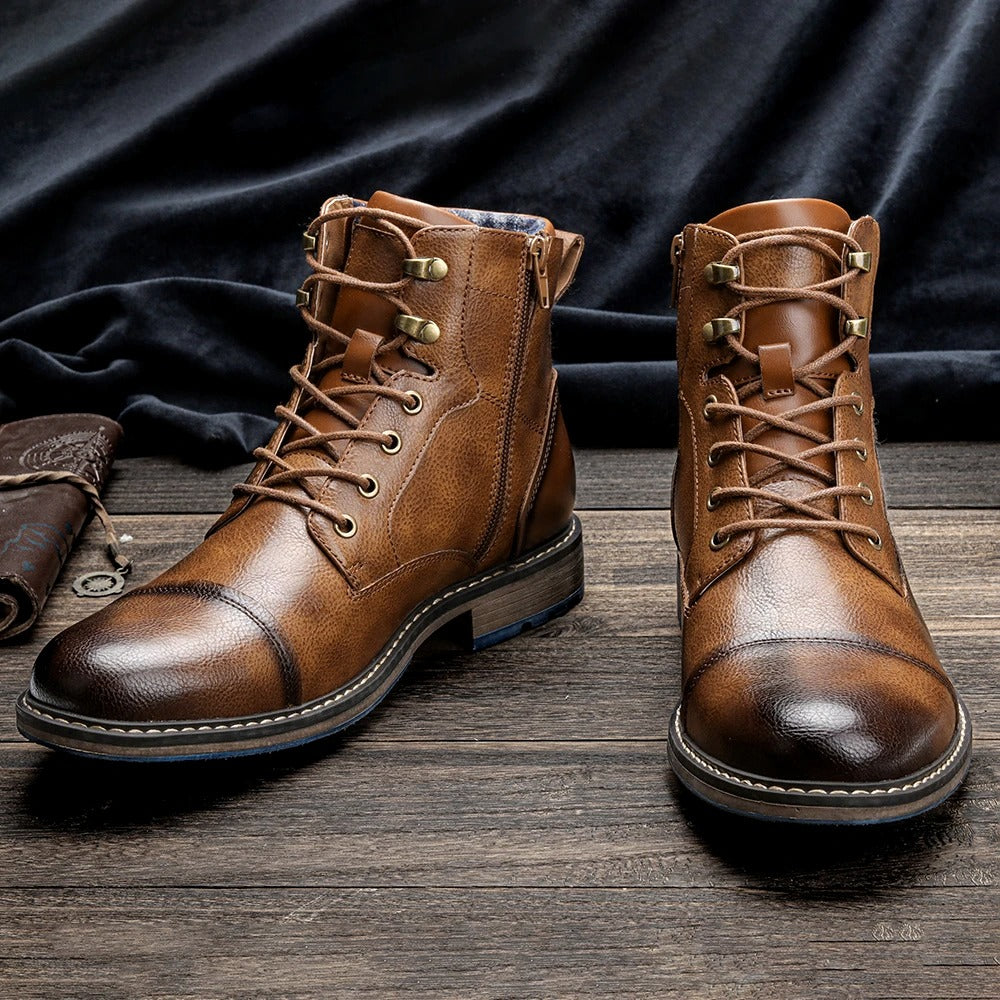 Herenenkelboots van rundleer met neuskap en zijrits