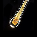 Wandlamp in druppelvorm met warme gloed