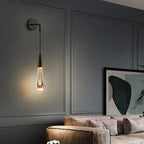 Wandlamp in druppelvorm met warme gloed