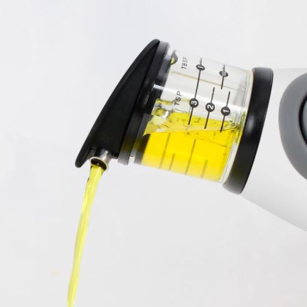 Oliedispenser met maatverdeling