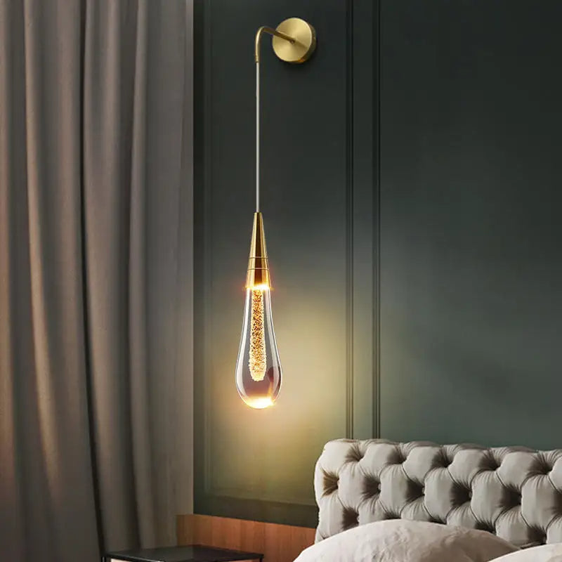 Wandlamp in druppelvorm met warme gloed