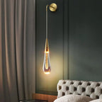 Wandlamp in druppelvorm met warme gloed
