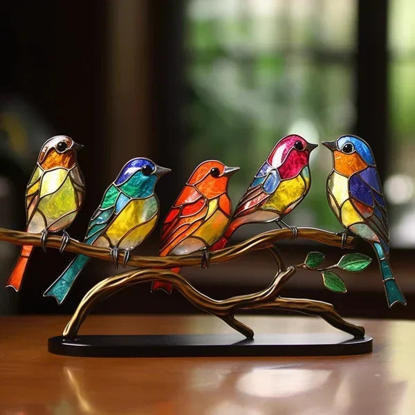 Decoratieve vogelbeeldjes met gekleurde afwerking
