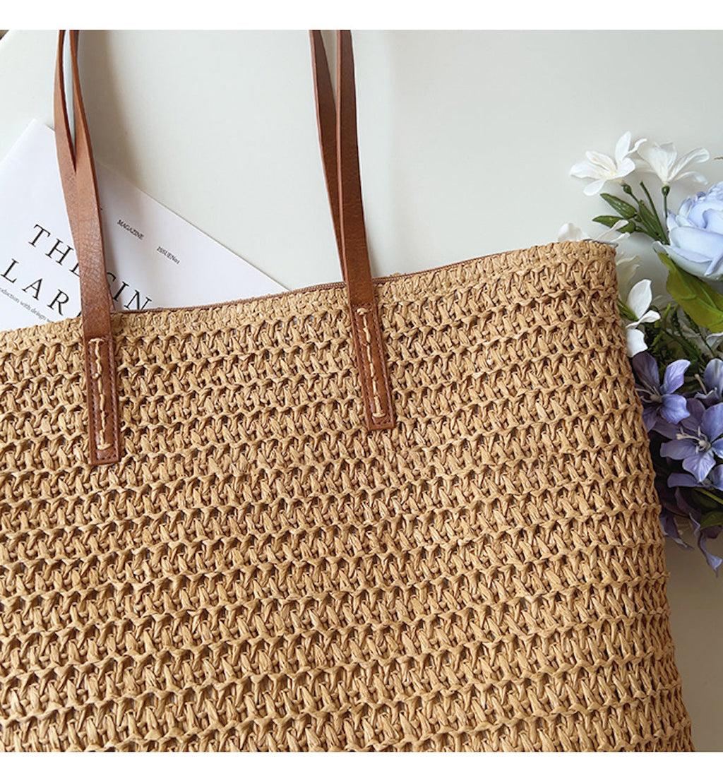 Riet geweven tas met leren banden