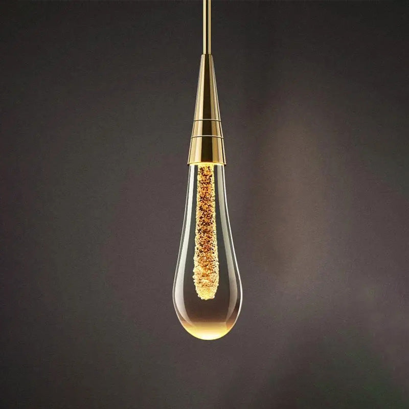 Wandlamp in druppelvorm met warme gloed