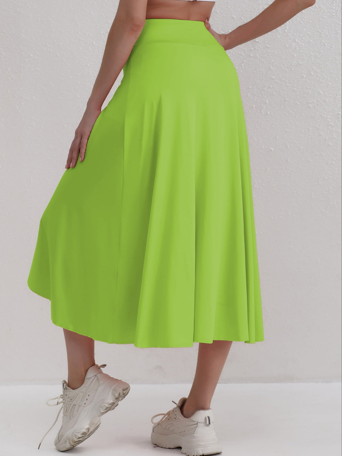 Sportieve rok met hoge taille en asymmetrische snit