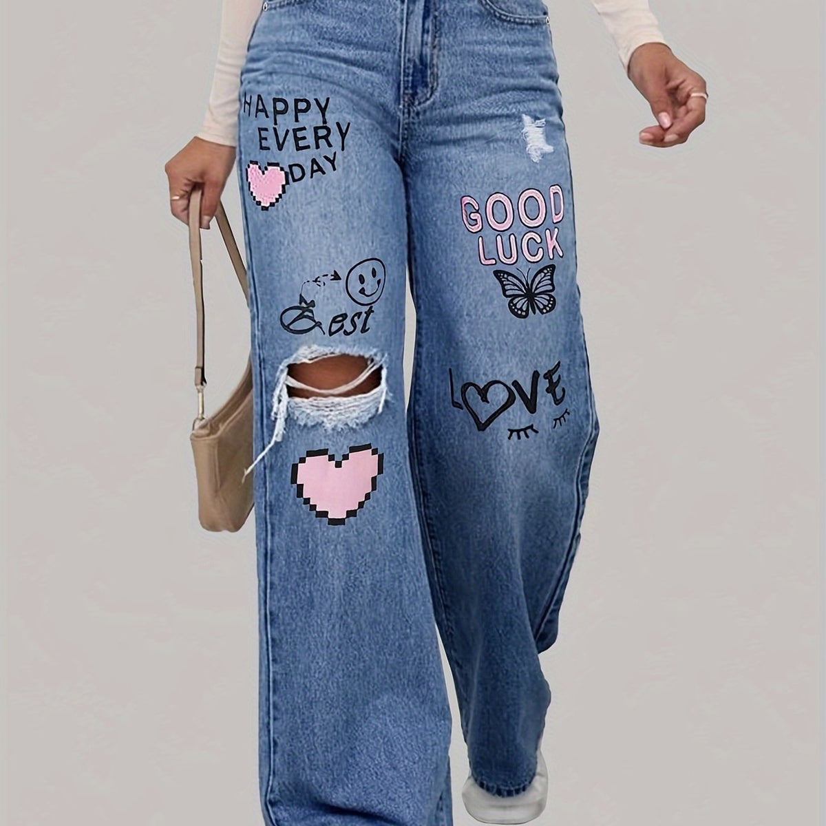 Dames jeans met hartjes- en graffitiprint