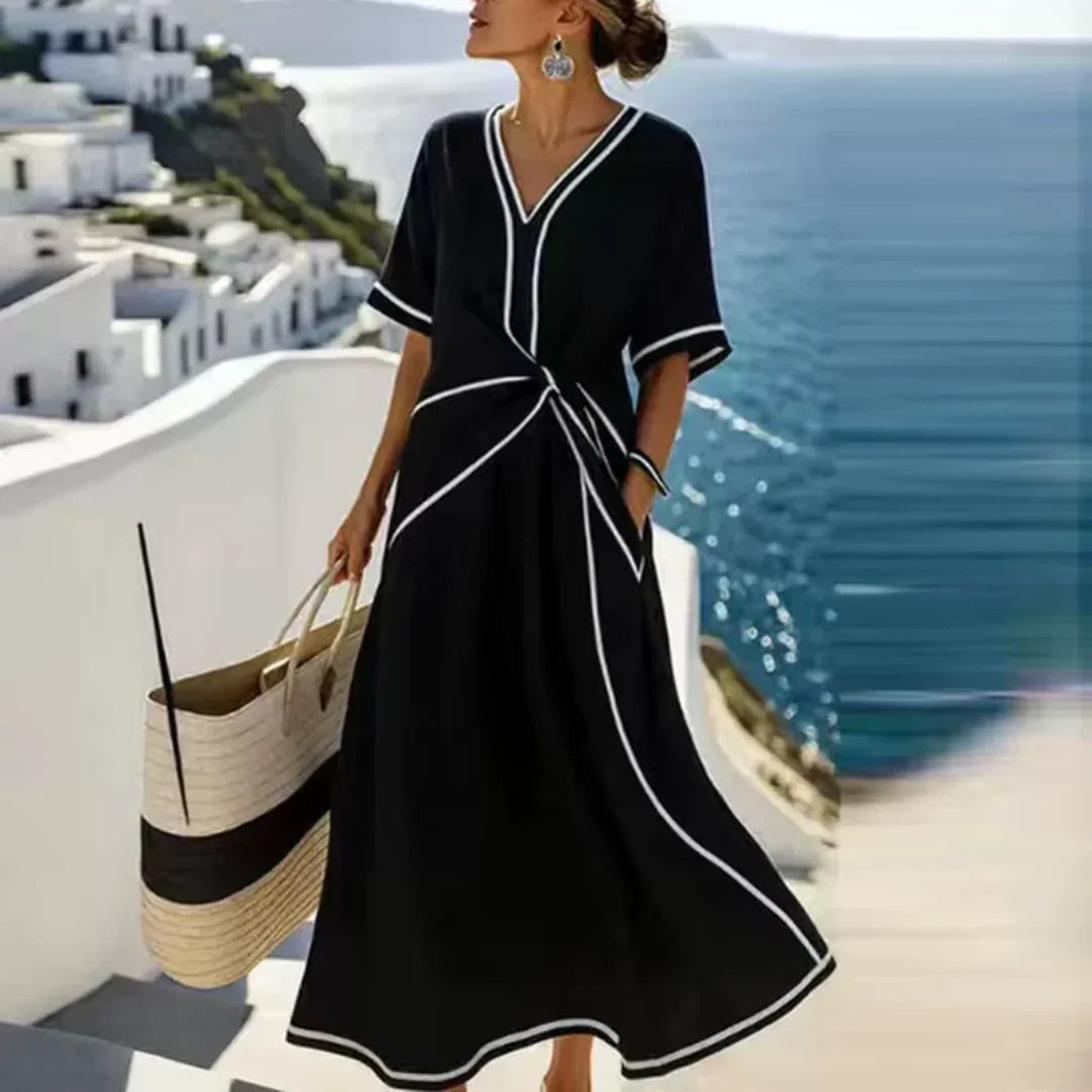Iris | Elegante jurk met V-hals en flatterend tailledetail