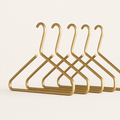 Garderobehangers in mat goud & zilver