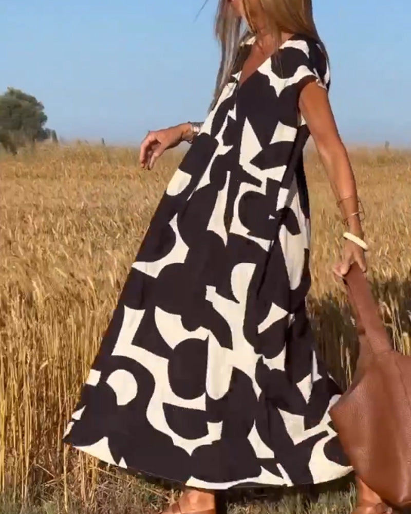 V-Hals maxi jurk met print