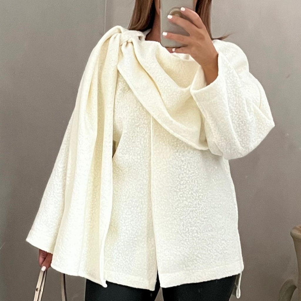 Bouclé poncho met sjaaldetail