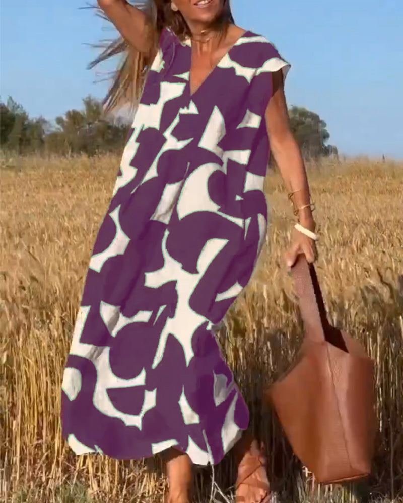 V-Hals maxi jurk met print