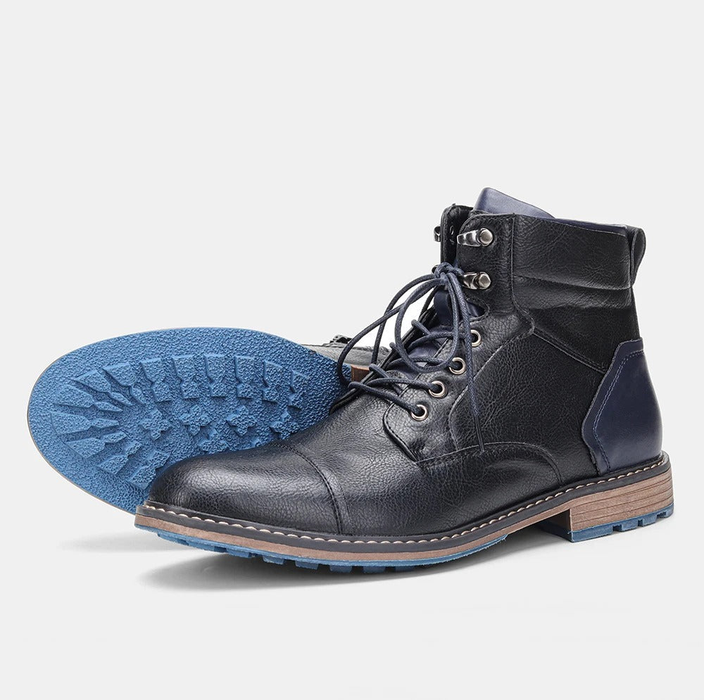 Herenenkelboots van rundleer met neuskap en zijrits