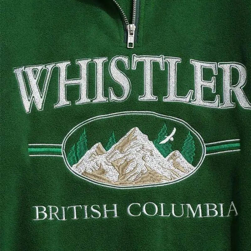 Retro whistler trui