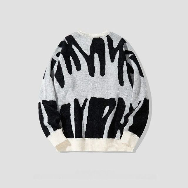Trui met gedurfd abstract patroon