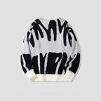 Trui met gedurfd abstract patroon