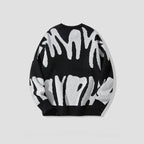 Trui met gedurfd abstract patroon
