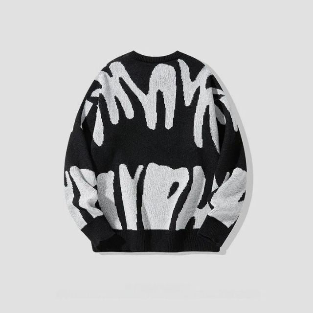 Trui met gedurfd abstract patroon