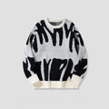 Trui met gedurfd abstract patroon