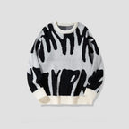 Trui met gedurfd abstract patroon