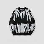 Trui met gedurfd abstract patroon