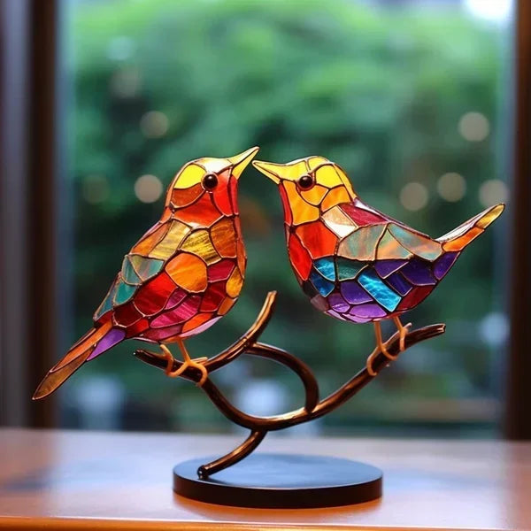 Decoratieve vogelbeeldjes met gekleurde afwerking