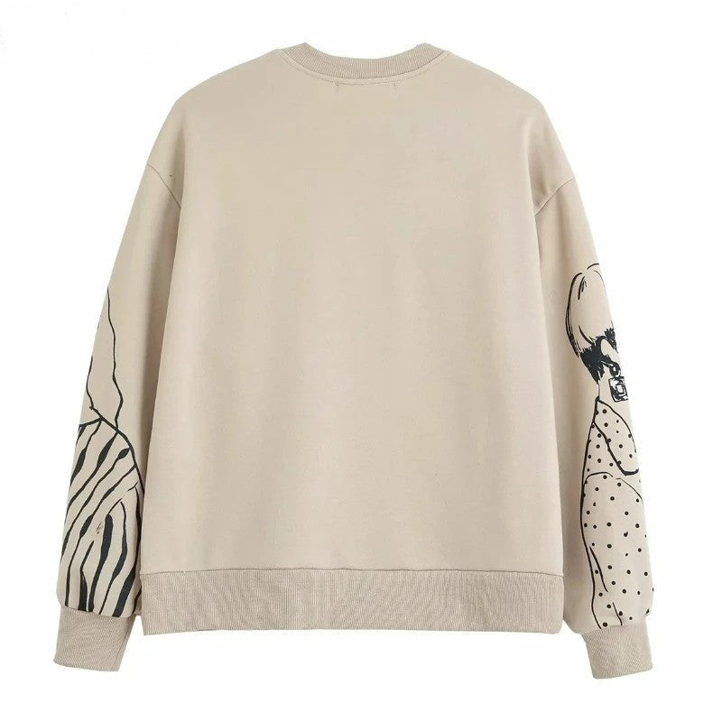 Losvallende wolprint sweater