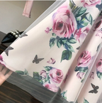 Outfit met mesh en bloemenmotief