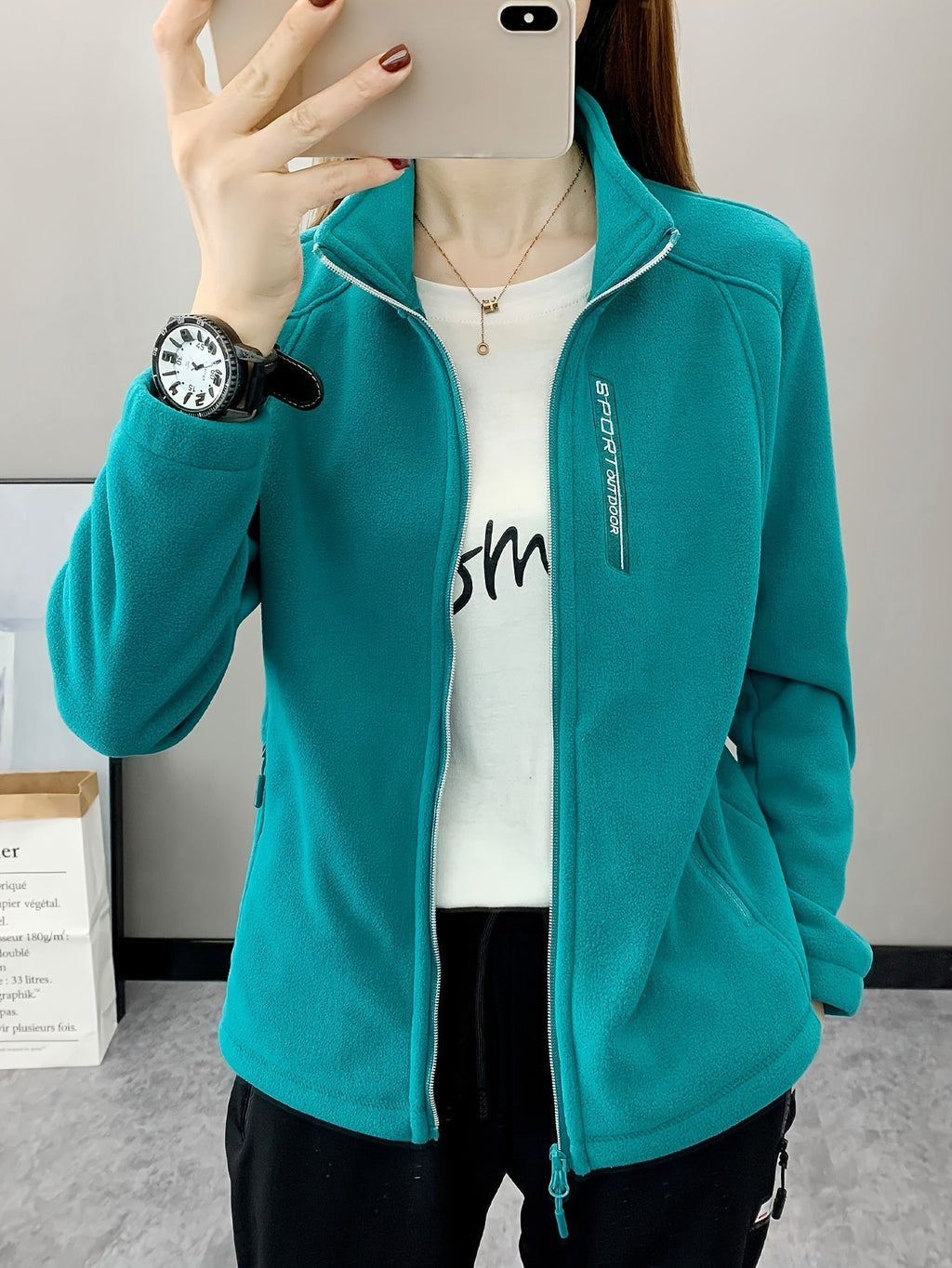 Ademende fleece jas