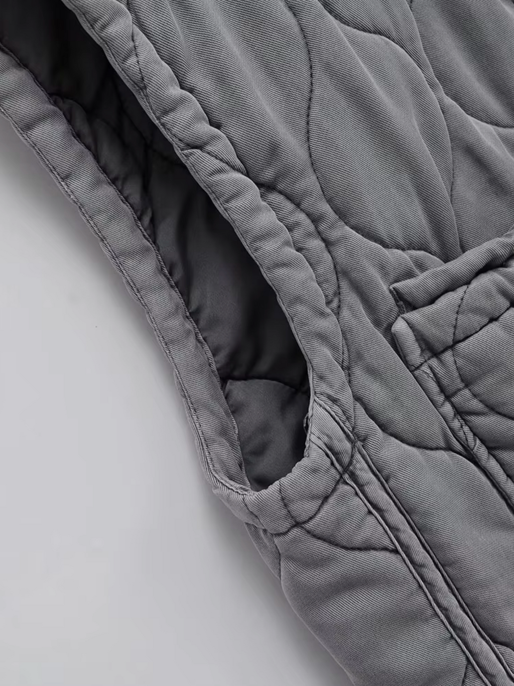 Grijze mouwloze katoenen bodywarmer