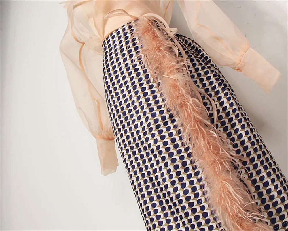 Tweedelige chiffon zomerset met riem en rok