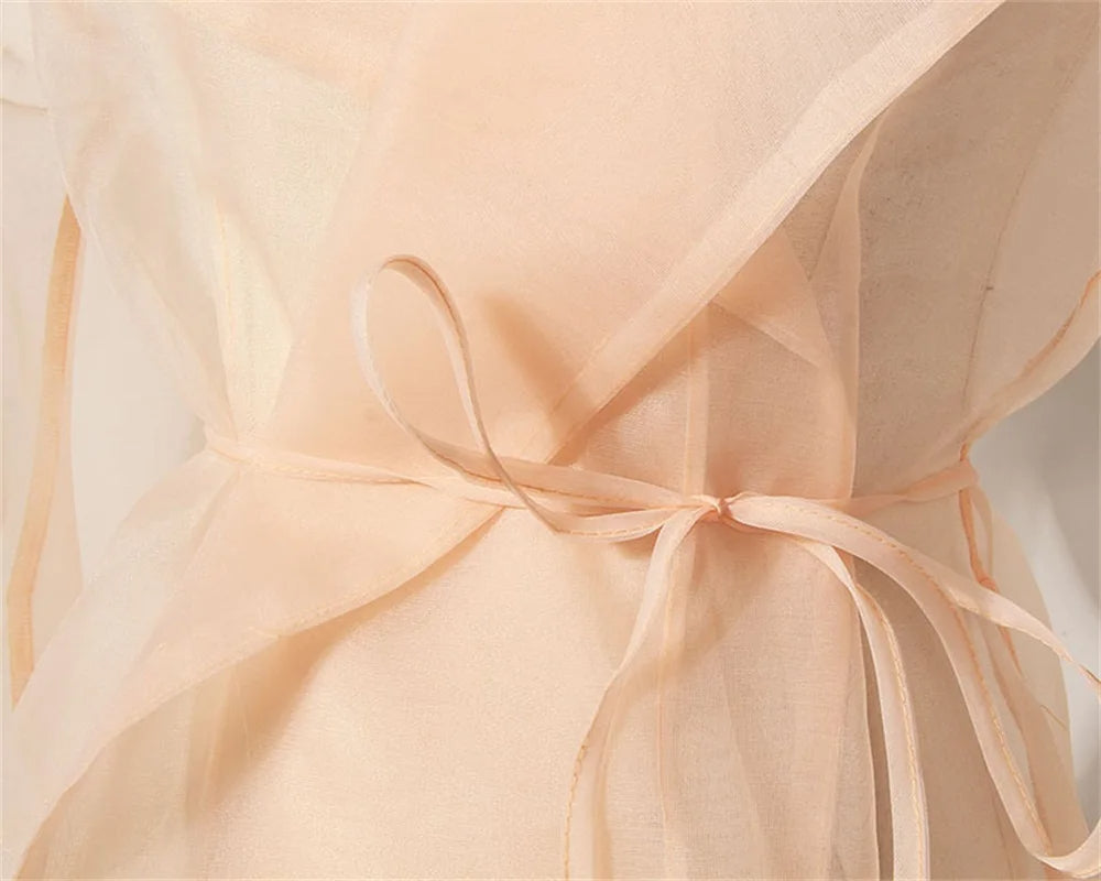 Tweedelige chiffon zomerset met riem en rok