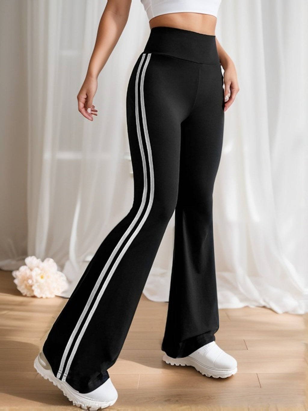 Gestreepte dames flared broek met hoge taille