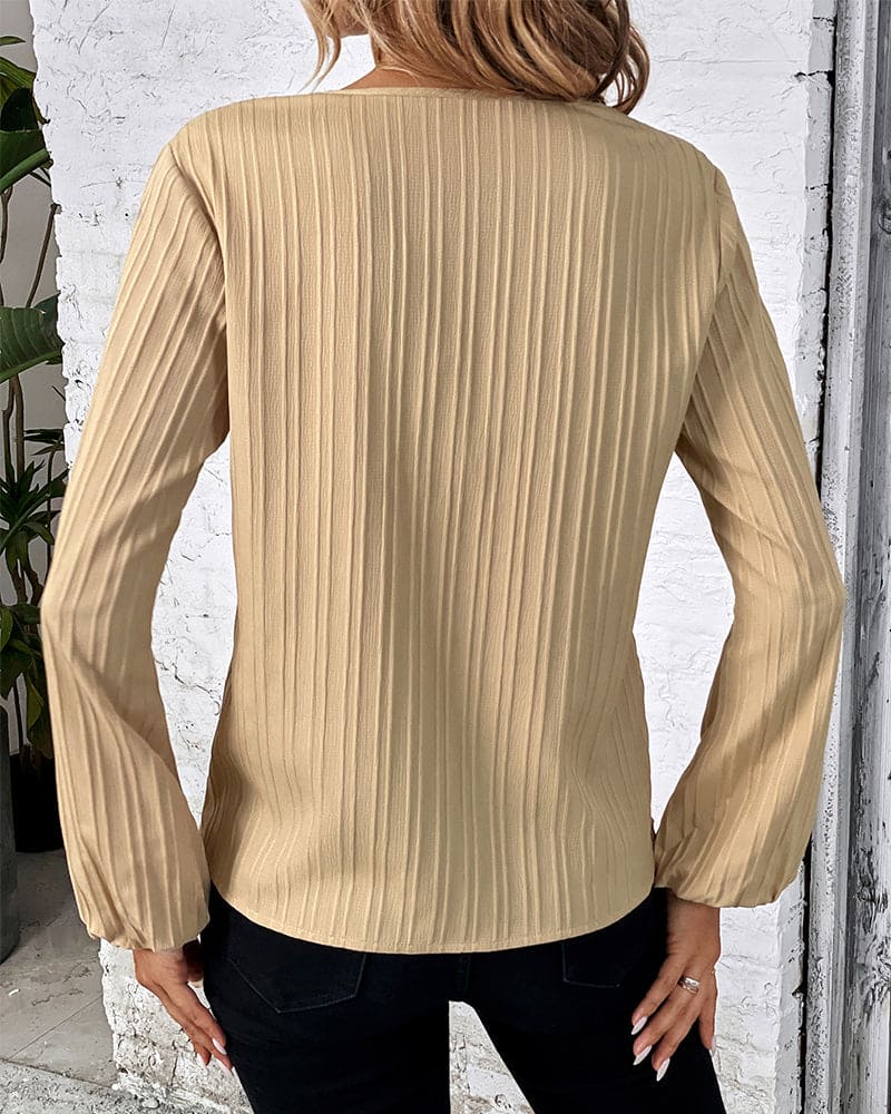 Blouse met lange mouwen en V-hals