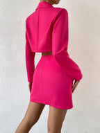 Roze outfit met knopen