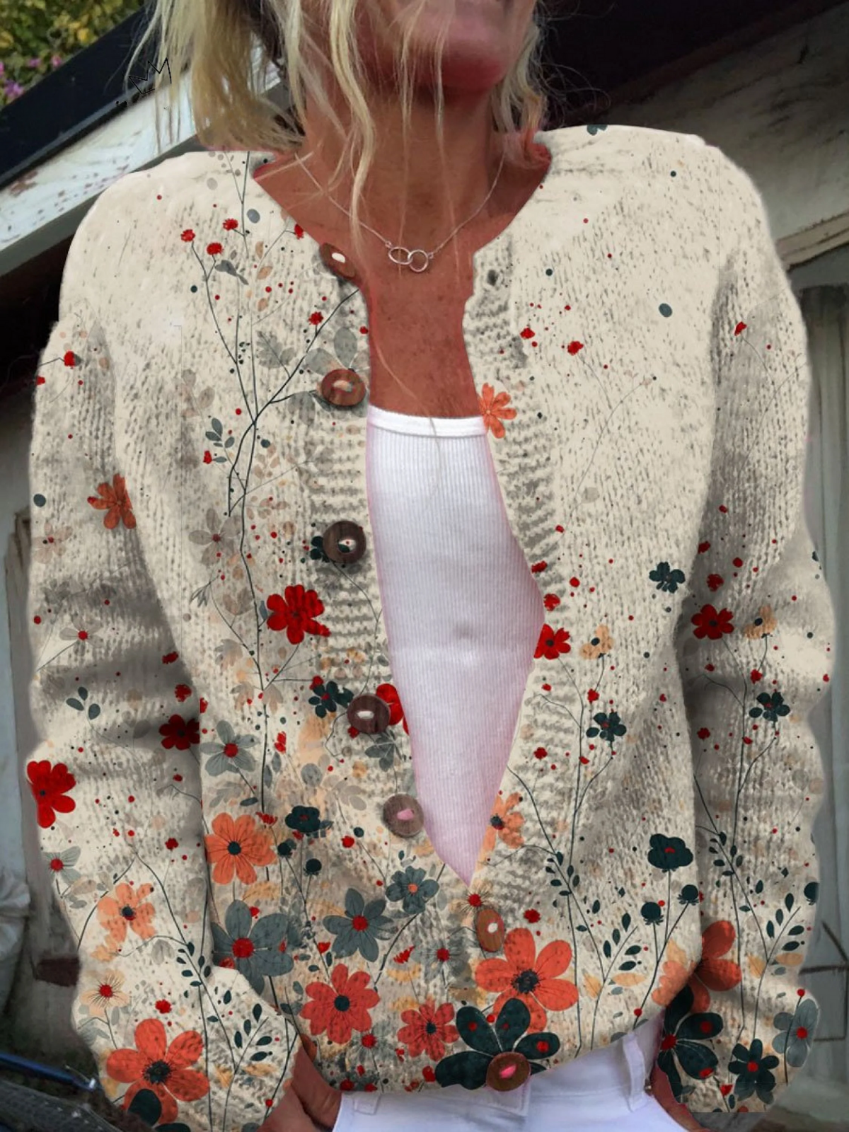 Gebreid vest met vintage bloemenprint in rood en koraal